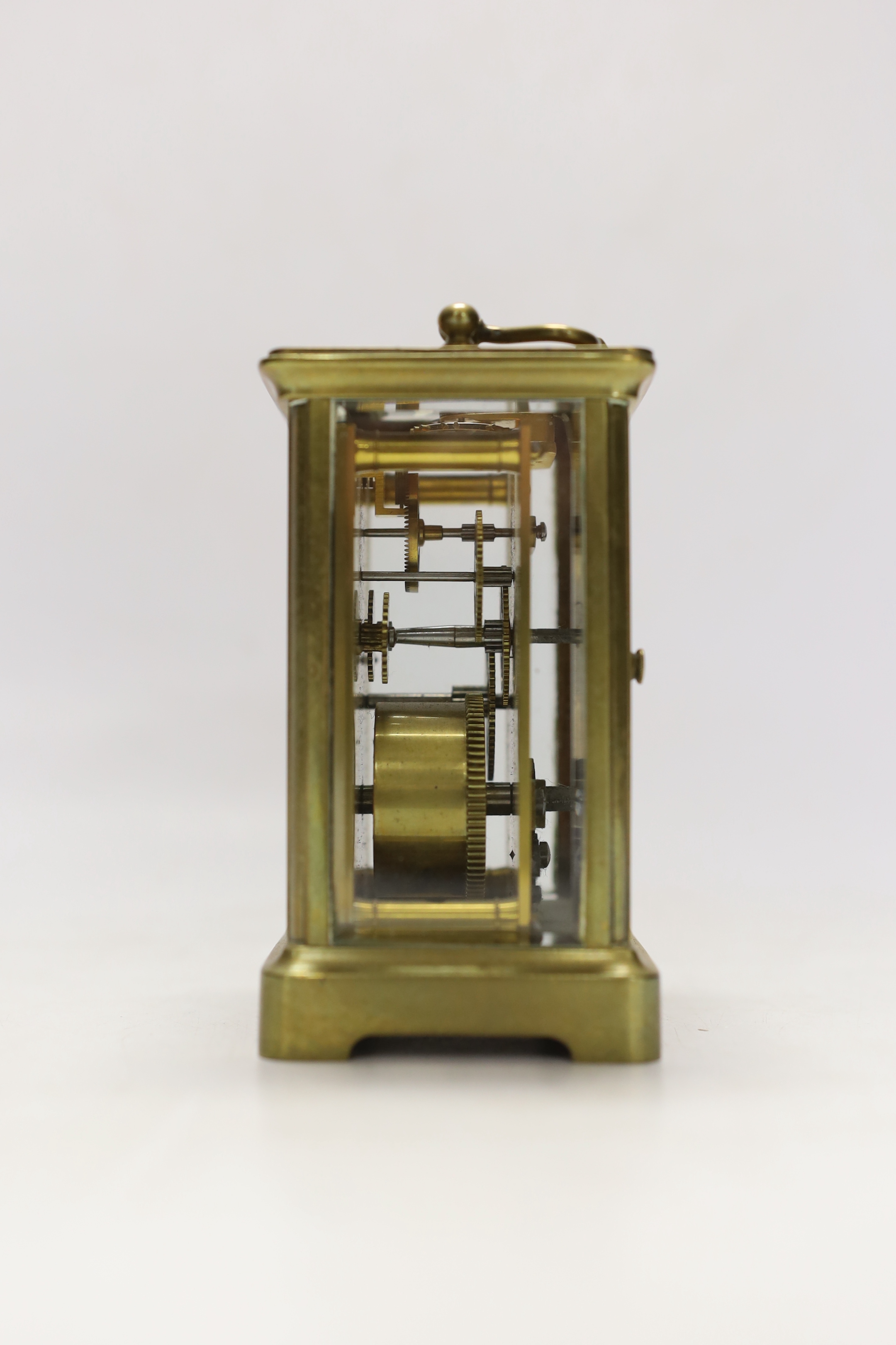 An early 20th century French lacquered brass carriage clock, cased
